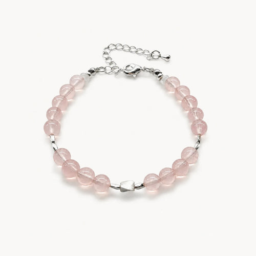 First Blush Poise Bracelet with rose quartz, white quartz rondelles, and 925 sterling silver accents on a white background