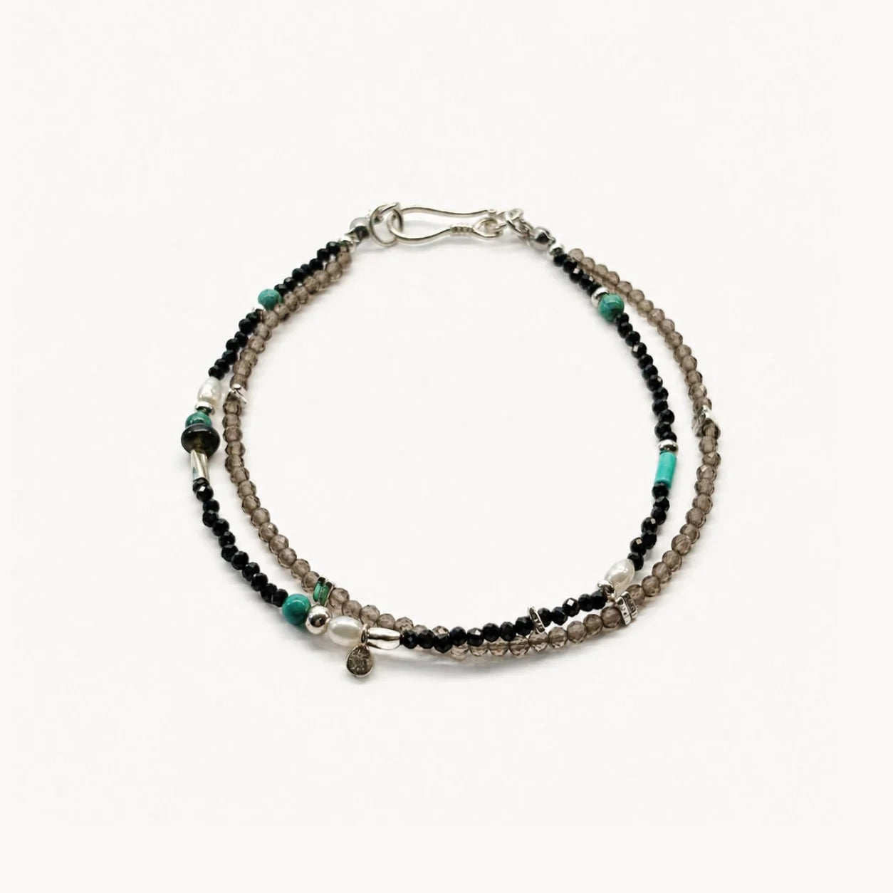 Strata Still Current Bracelet with black spinel, smoky quartz, turquoise, pearl, and 925 sterling silver details