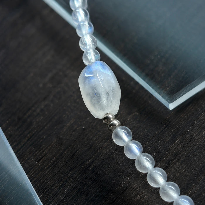 Close-up of the Veiled Light Echo Bracelet with blue moonstone, grey moonstone, obsidian, and sterling silver accents